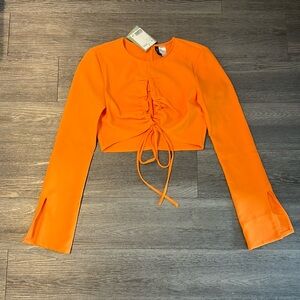 NWT H&M orange cut out crop top S